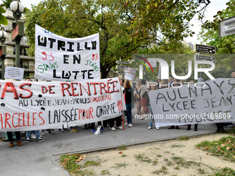 Protesters hold a banner agaist ZEP 93 (zone of priority educational program) High School from the 93 County of Ile de France. Strike and Pr...