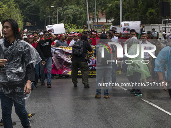 Hundreds of Rohingya refugees in Malaysia shout slogans during a protest against the violence of Rohingya Muslims in Myanmar at outsude of M...