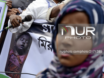 Saba (5),  during a protest rally against the persecution of Rohingya Muslims in Myanmar, after Friday prayers in Dhaka on September 08, 201...
