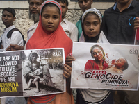 Indian Muslim children protesting against the Rohingya genocide of Myanmar in Kolkata, India, on September 2017. People of Kolkata has organ...