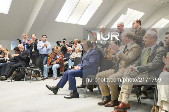 People applaude Nigel Farage (Ukip, C) during an event organized from the Alternative for Germany (AfD) at the Citadel Spadau in Berlin, Ger...