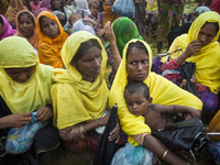 Rohingya ethnic minority people waiting for relief at a temporary makeshift camp after crossing over from Myanmar into the Bangladesh side o...