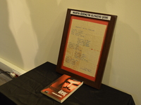 A book and a handwriting poetry of a victim is pictured on the opening day of the September 12 Shame Museum, which is held with the help of...