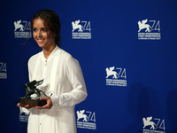 Lyna Khoudri wins the Orizzonti Prize for Best actress with the film 'Les Bien heureux' during Ceremony Awards of the 74th Venice Internatio...