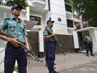 Bangladeshi Police stand guard in front of Myanmar Embassy in Dhaka, Bangladesh, on September 10, 2017.  Tens of thousands more people have...