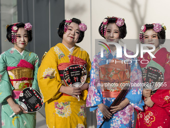 Japanese ladies living in Malaysia wearing traditional Yukata costumes during the annual 'Bon Odori' festival celebrations in Kuala Lumpur,...