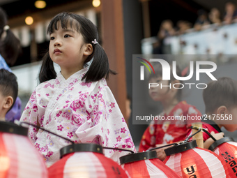 Japanese kids living in Malaysia wearing traditional Yukata costumes during the annual 'Bon Odori' festival celebrations in Kuala Lumpur, Ma...