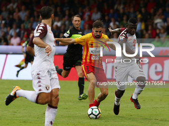 Player of Benevento Calcio Marco D'Alessandro vies with Torino FC Acquah Afriyie during the Serie A match between Benevento Calcio and Torin...