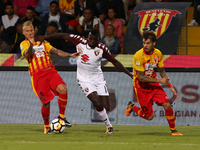 Amato Ciciretti (L) and Lorenzo Venuti (R) of Benevento compete with Niang M'Baye (C) of Torino during the Serie A match between Benevento C...