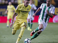 10 Samu Castillejo of Villarreal CF (L) in action against 08 Camarasa of Real Betis Balompi (R)   during  spanish La Liga match between Vill...