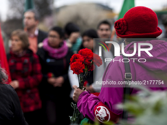 Osorno, Chile. 11 September 2017. Relatives of disappeared detainees with red carnations. Relatives of the Disappeared, former political pri...