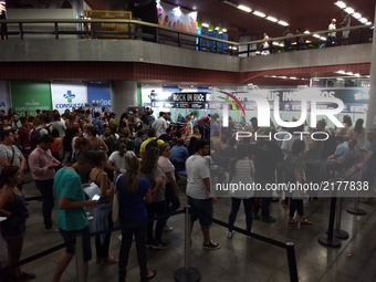 Hundreds of people waiting in line inside a subway station in Rio de Janeiro, Brazil, September 11, 2017 to pick up the tickets purchased th...