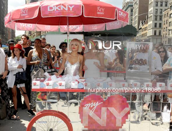 Rita Ora and model Chrissy Teigen attend as DKNY celebrates the launch of the new DKNY MYNY fragrance at General Worth Square at Madison Squ...