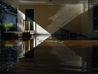 Water comes up to roofs of homes near Black Creek in Middleburg, FL, on September 12, 2017 after water levels rose from Hurricane Irma. The...