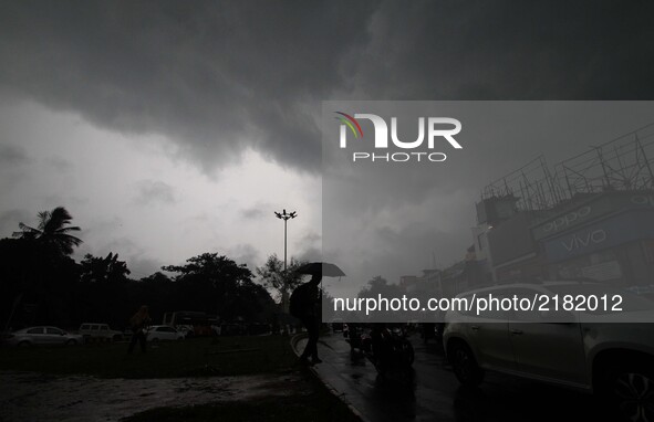 Rain clouds hover in the sky before downpour in the eastern Indian state Odisha's capital city Bhubaneswar on 13 September 2017. 