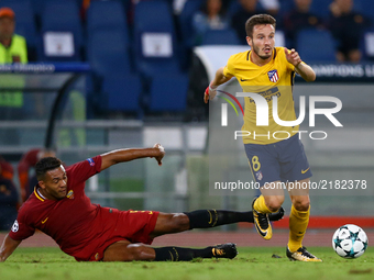 
Juan Jesus of Roma tackling on Saul Niguez of Atletico  during the UEFA Champions League Group C football match between AS Roma and Atletic...