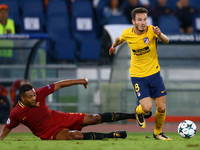 
Juan Jesus of Roma tackling on Saul Niguez of Atletico  during the UEFA Champions League Group C football match between AS Roma and Atletic...