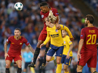 
Juan Jesus of Roma and Antoine Griezmann of Atletico  during the UEFA Champions League Group C football match between AS Roma and Atletico...