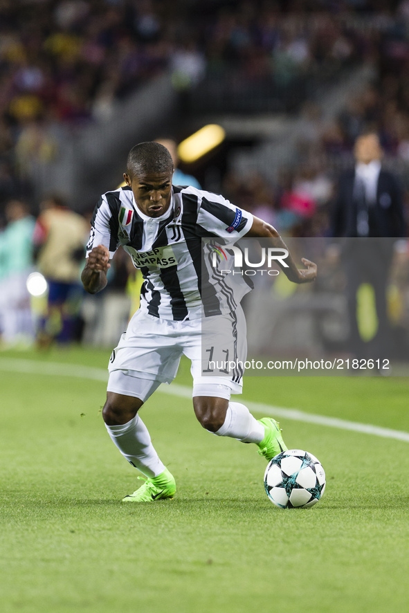 Douglas Costa during the match between FC Barcelona - Juventus, for the group stage, round 1 of the Champions League, held at Camp Nou Stadi...