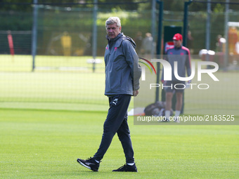 Arsenal manager Arsene Wenger 
during a Arsenal training session ahead of the UEFA Europa League Group H match against 1. FC Kln at Arsenal...
