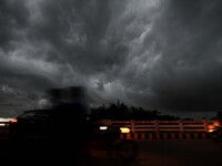 Rain clouds hover in the sky before a sudden downpour in the eastern Indian state Odisha's capital city Bhubaneswar, India, on September 13,...