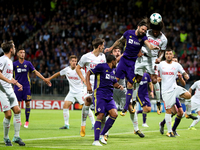 Marko Suler of NK Maribor challenges Luis Adriano of Spartak Moskva during the UEFA Champions League Group E match between NK Maribor and Sp...