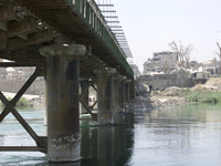 The old city of West Mosul across the Tigris by the old bridge. The neighbourhood is largely destroyed, but efforts are made to repair the o...