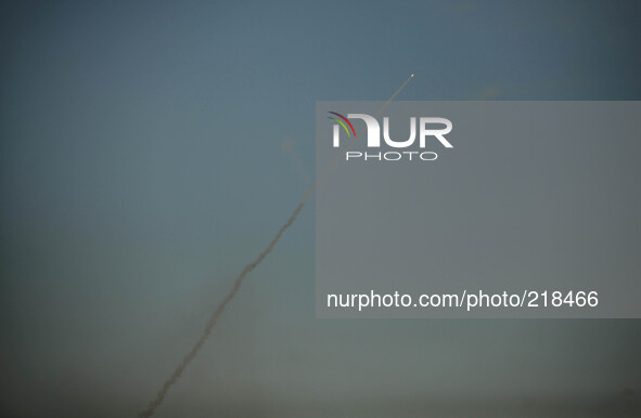 Smoke trails are seen as rockets are launched from the Gaza Strip towards Israel August 20, 2014.Abu Ubaida, the spokesman of the Izz el-Dee...