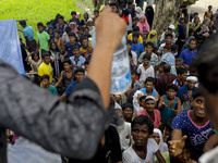 Myanmar Rohingya Refugees raise their hands to get water relief in Ukhiya, Bangladesh 14 September 2017. According to United Nations more th...