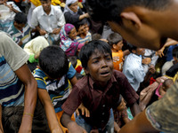 Myanmar Rohingya Refugees boy cry to get relief in Ukhiya, Bangladesh 14 September 2017. According to United Nations more than 300 thousand...