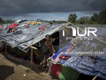 Rohingya refugee take shelter in the road side makeshift camp in Ukhiiya, Bangladesh 14 September 2017. According to United Nations more tha...