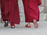 Tibetan Buddhist monks attend the Dalai Lama, Tenzin GYATSO, at the Greek Theatre in Taormina, Italy on 16 September 2017. The spiritual lea...