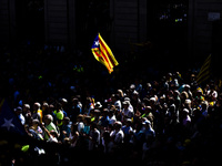 Catalan Independence supporters wave Esteladas (Catalan pro-independence flag) during a demonstration of Catalan Mayors backing Independence...
