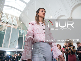 A model walks the runway of Sabinna's show and presentation at the London Fashion Week September 2017, in London on September 16, 2017. (