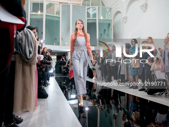 A model walks the runway of Sabinna's show and presentation at the London Fashion Week September 2017, in London on September 16, 2017. (