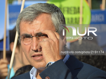 Turkey's main opposition Republican People's Party (CHP) Deputy Necati Yilmaz attends a protest against the Turkish government's new educati...
