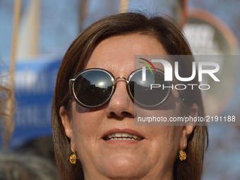 Turkey's main opposition Republican People's Party (CHP) Deputy Gaye Usluer attends a protest against the Turkish government's new education...