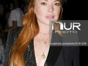 Actress Lindsay Lohan is seen at the Malne show during Mercedes-Benz Fashion Week Madrid Spring/Summer 2018 at Ifema on September 15, 2017 i...