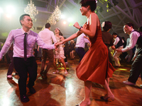 Thais and foreigners perform swing dance during the 'Diga Diga Doo 2017 in Chinatown Bangkok, Thailand, at 16 September 2017. (