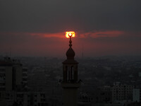 Sunrise in Gaza City .Israel will step up the offensive in the Gaza Strip until rocket firing from there into Israel stops, Prime Minister B...