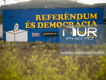 In the village of Tona (50 kms. north Barcelona), Spain, a mural  painted on the wall of a house reading 'Referendum is Democracy' on 16 Sep...