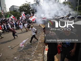 Jakarta August 21st 2104. Hundreds of demonstrant dissmissed by the police near the Indonesian Law constitutional building at Merdeka street...