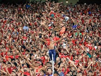Ahly fans cheer before the CAF Champions League quarterfinal first-leg football match between Egypt's Al-Ahly and Tunisia's Esperance of Tun...