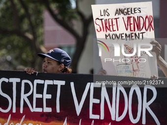 People protest harassment and attacks on street vendors in Los Angeles, California on September 16, 2017. (Photo by: Ronen Tivony) (