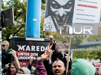 Counter-protesters shout parole in the direction of the demonstration  in Berlin, Germany, on 16 September 2017. Under the motto 