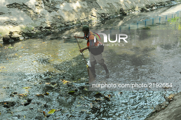 Jakarta city cleaners launched a river flow of 8 meters in Menteng, Jakarta, Indonesia, on September 17,2017. these activities are routinely...
