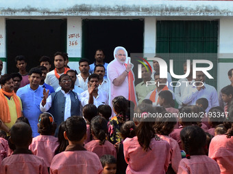 Students of Primary school take part in an event as they celebrate on the eve of Indan Prime Minister Narendra Modi's Birthday , in Bhiti vi...
