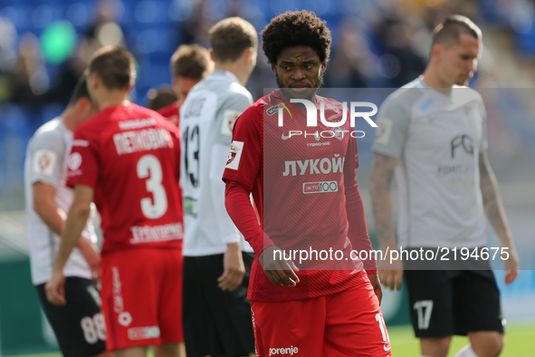 Luiz Adriano (C) of FC Spartak Moscow looks on during the Russian Football League match between FC Tosno and FC Spartak Moscow at Petrovsky...