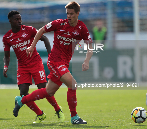 Mario Pasalic (R) and Quincy Promes of FC Spartak Moscow vie for the ball during the Russian Football League match between FC Tosno and FC S...