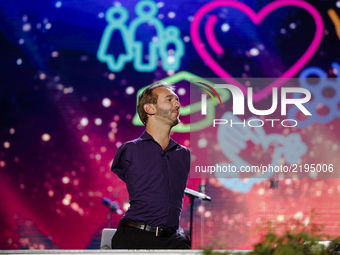 Australian Christian evangelist and motivational speaker Nick Vujicic  who was born without limbs performs op-air in Kyiv, Ukraine in front...